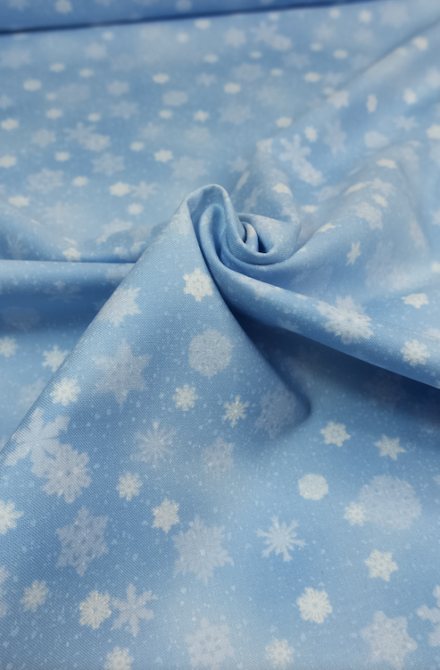 Ткань "Снежинки на голубом фоне" 